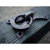 wrought iron ring pull on a wooden beam made by gaaluub
